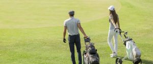 couple playing golf